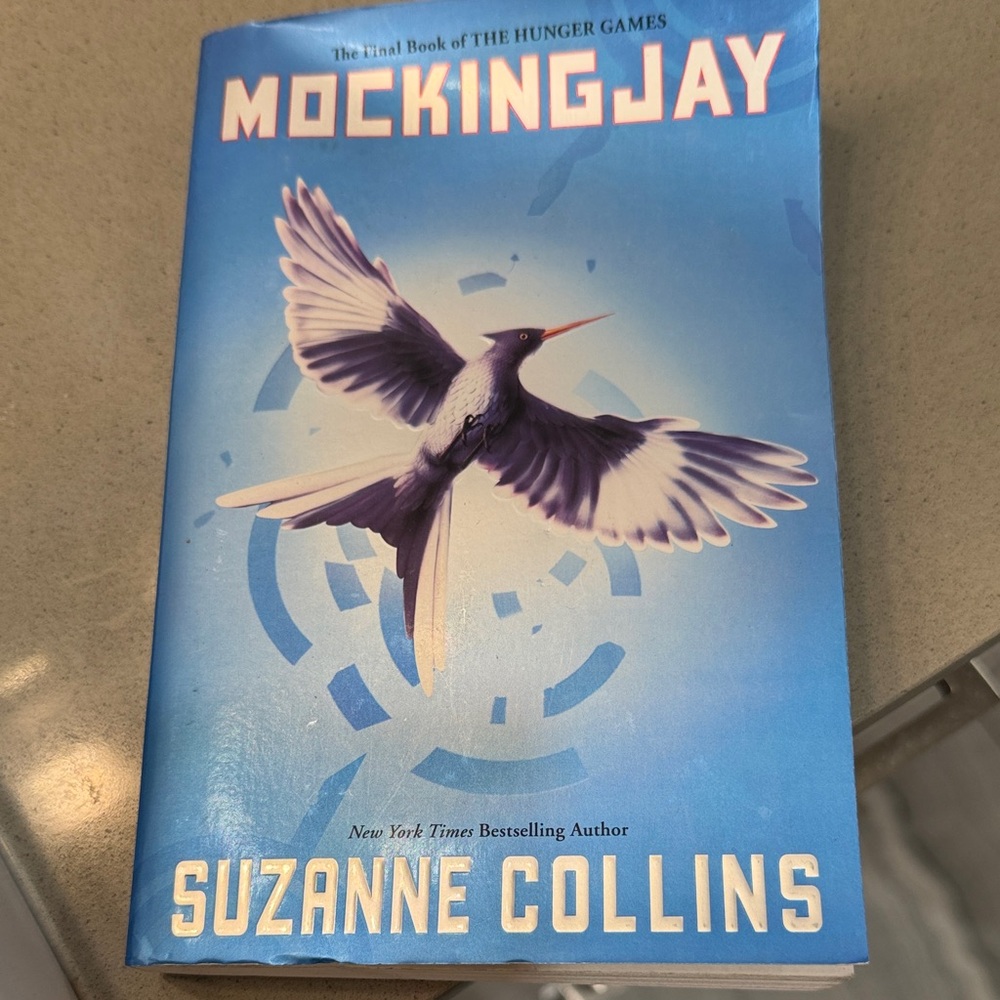 Scholastic Blue Mockingjay Book